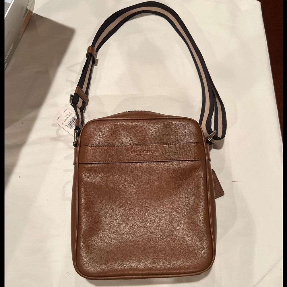 Brand New Brown Coach Flight Bag.